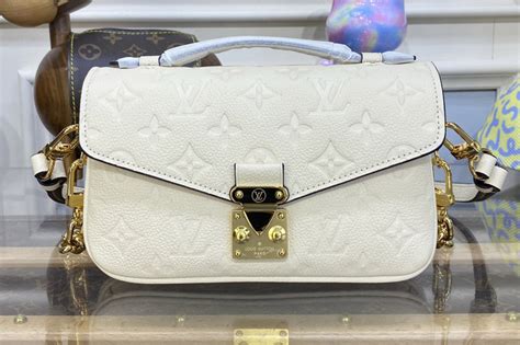 lv pochette cream|Pochette Métis Monogram Empreinte Leather .